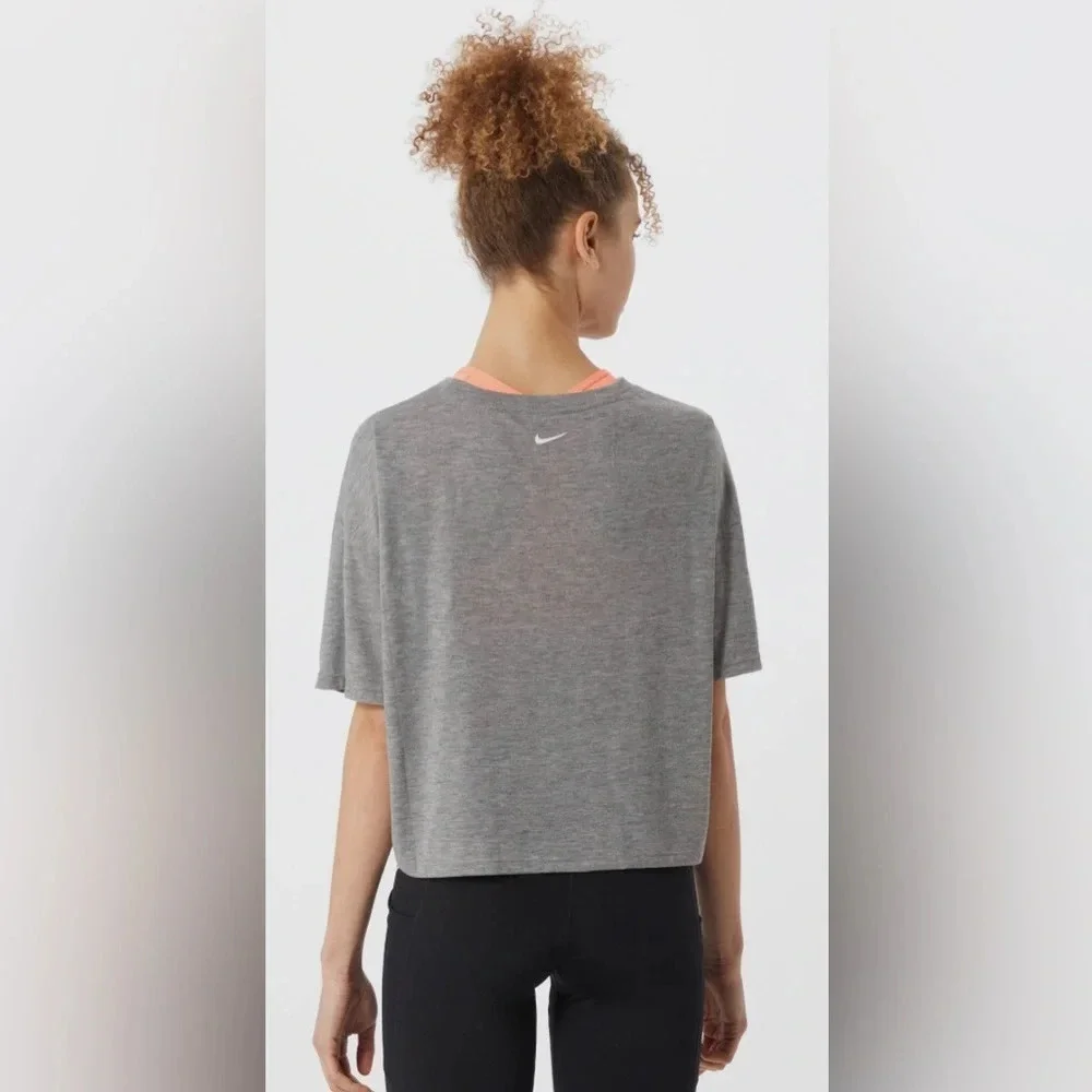 Nike dri-fit oversized gray training crop front pocket logo T-shirt